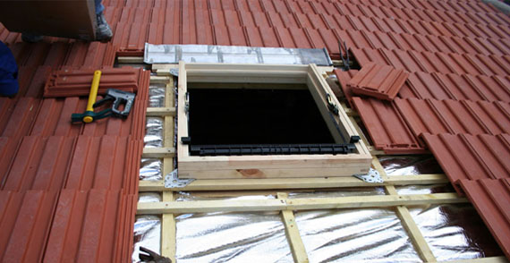 Combles aménagés avec fenêtre de toit Velux